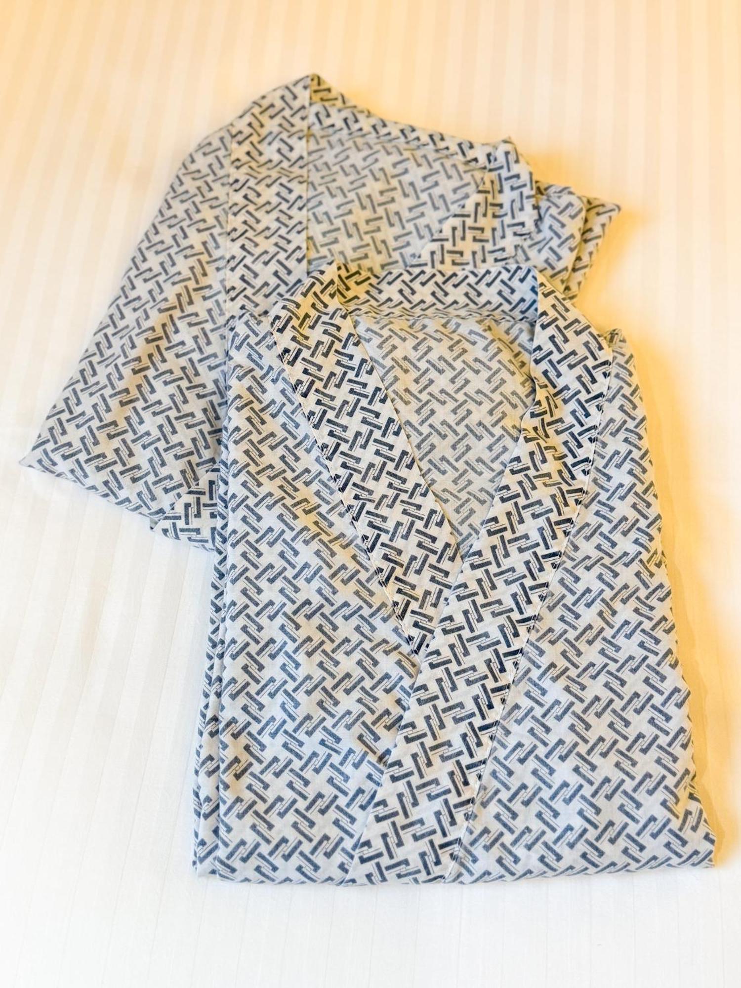 The Landis Taipei Exterior foto A shirt with a Greek key pattern